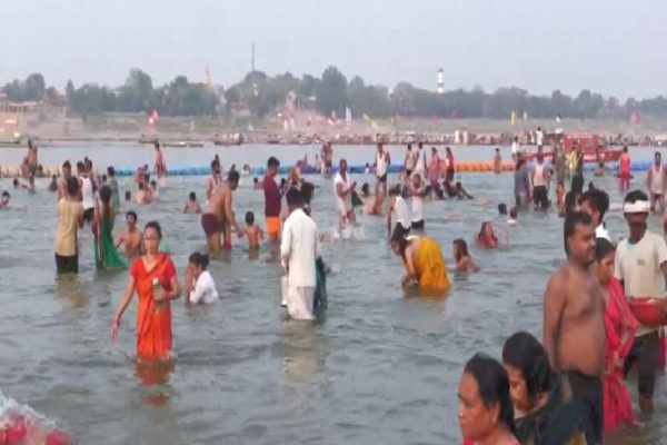 Up: Thousands Take Holy Dip