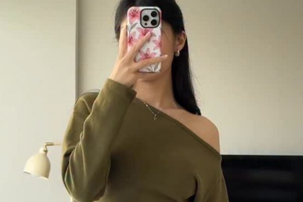 The Stylists’ Trick to Transform a Sweater’s Look